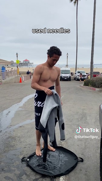 Why Do Surfers Take Off Their Wetsuit on a Changing Mat?