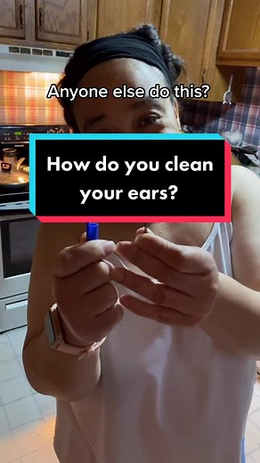 Mother Cleaning Ear: A Familiar Routine
