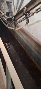 Powder Coating Facility 150 meters long A specialized manufacturing plant where items, most commonly metal parts, are prepared and coated with a durable, hard, and corrosion-resistant finish using a powder material that is applied electrostatically and then cured with heat. These facilities are equipped with the machinery and infrastructure to perform the multi-step process, which includes surface preparation (cleaning, sanding, masking), the electrostatic application of the dry powder, and the 