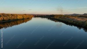 Flying Over the Connecticut River from Hadley, Massachusetts, USA. Fall colors at sunset.