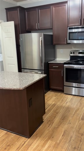 Praying for the blue sky to return! In the meantime, cozy up in this A1SR floor plan for the winter! The sunroom just off the living room gives you extra space and a storage closet inside without having to brave the cold! #hardwoodfloors #rampartnersllc #onebedroomapartment #gallatinliving | Vintage Crossing Apartments