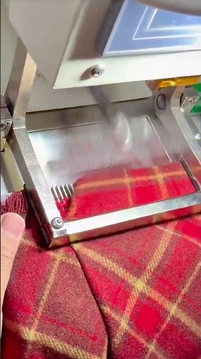 Making Neat Decorative Fringe on a Red Plaid Scarf Using an Automatic Sewing Machine