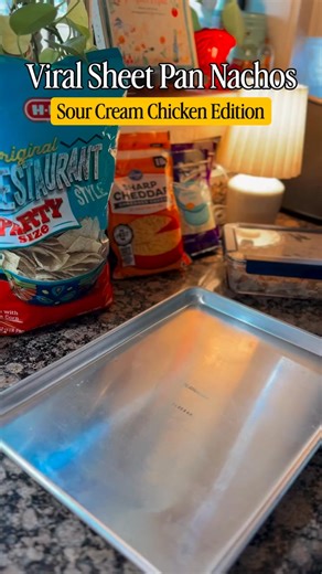 I finally tried the Viral Sheet Pan Nachos! And they did not disappoint!! I decided to put my own spin on them and make Sour Cream Chicken Nachos. I had a ton of left over chicken and always have sour cream on hand… so we went for it!!! Y’all… 🤯 Added to my list of favorite nachos. (Is this a nacho channel now?!? 🤷🏻‍♀️) Recipe below Viral Sheet Pan Nachos: Sour Cream Chicken Edition Ingredients: 16oz sour cream 1 cup chicken broth 8oz diced green chiles, 2 small cans Shredded chicken, leftove