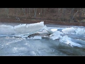 Dangerous road to the dugout. The motorcycle went under the ice.
