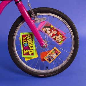Add some bling to your bike with these spoke cards made out of a Pebbles Cereal box! | Pebbles Cereal