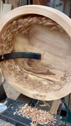 Trying my best to keep this bowl in one piece. As I’m trying to turn this from green to finished I’ve been taking small cuts over several days. This bowl has almost everything. Small bark inclusion, endgrain from where a branch grew, crotch figure, spalting. If it all holds I’m super excited. I first roughed out the main shape of the bowl and left it about an inch thick. Since then I’ve been letting it sit in wood shavings as it sheds water and I’ve turned it an additional 3 times removing just 