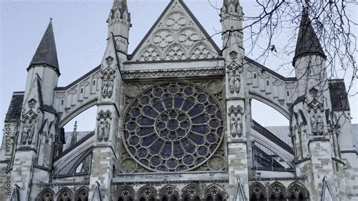 The stunning facade of Westminster Abbey in London, UK. Gothic architecture and the iconic Rose Window.