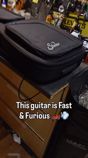 Inspired by the exotic sophistication of Italian supercars, this Suhr Andy Wood signature guitar is begging to be played at blistering speeds. Suhr Andy Wood 10th Anniversary Modern T Electric Guitar 🏎️ Arancio Orange finish and carbon fiber pick guard 🏎️ Swamp ash body and roasted maple neck 🏎️ Woodbucker pickups 🏎️ Jumbo stainless steel frets 🏎️ Suhr locking tuners #guitar #suhr #suhrguitars #electricguitar #guitarporn #guitarcollector #guitarcollection | Chuck Levin's Washington Music Ce