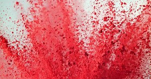 Explosion of Vibrant Red Powder in Slow Motion