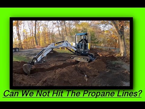 Bobcat E26 Mini Excavator Digging Up Connecticut