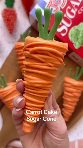 These Carrot Cake Sugar Cones are almost too cute to eat—almost! Perfect for spring parties, taster treats, or just a little whimsical fun, these sweet cones are filled with moist carrot cake and dipped in orange and green chocolate to look just like real carrots. SAVE for Easter! 🥕 Ingredients: *Joy Sugar Cones *Carrot cake mix (store-bought or homemade) *Orange chocolate melts *Green chocolate melts Instructions: 1. Preheat oven according to your carrot cake recipe instructions. Be careful th