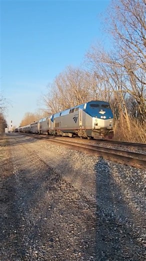 Amtrak Train #48 The Lake Shore Limited flies through the uprights (signals) at mile 81. 4826