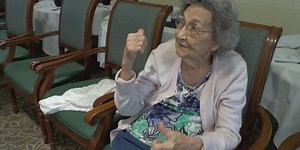 Little Bit Country Line Dancers dance with nursing home residents
