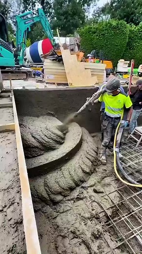 Swimming pool construction involves excavating the site, installing plumbing and electrical systems, building the pool shell with materials like concrete or fiberglass, and finishing with features like tiles and coping. Key phases include excavation, steel reinforcement, concrete application (shotcrete or poured), plumbing and electrical setup, waterproofing, and finally, plastering and tiling. The process requires careful planning, with a concrete pool taking at least two months to complete, wh