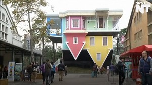 576K views · 2.7K shares | Hundreds of people are lining up to see this upside-down house | NowThis | Facebook