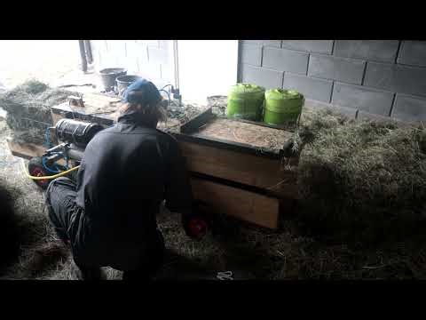 Home made square hay baler.