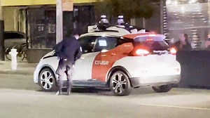 Watch self-driving car get pulled over by police and speed off