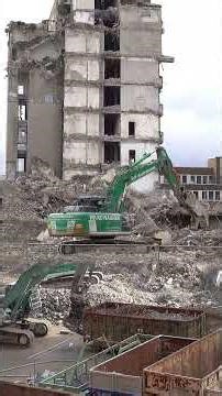 Demolition of an 8 story post office building (using a long reach excavator)