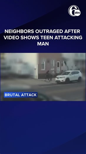 The victim falls to the ground as the teen runs across the street with his friends. One appears to be recording the incident on a phone. | 6abc Action News