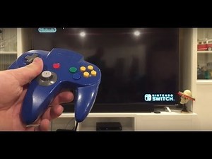 N64 controller / plugged into GameCube controller adapter / plugged into a WiiU multi port controller adapter / plugged into the Switch!