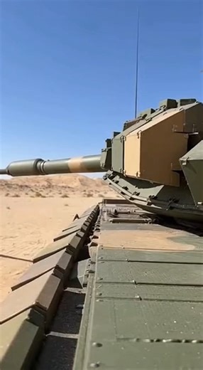 In stunning ultra-slow motion, a tank’s active protection system (APS) detects and fires a countermeasure just feet from the hull—intercepting an incoming rocket in a blinding explosion that saves the crew and vehicle. This split-second defense highlights how modern APS technology has revolutionized armored survivability against RPGs and ATGMs on today’s high-threat battlefields. #ActiveProtectionSystem #TankDefense #APS #AntiTankRocket #ArmorSurvivability #MilitaryTech #HighSpeedCapture #Modern