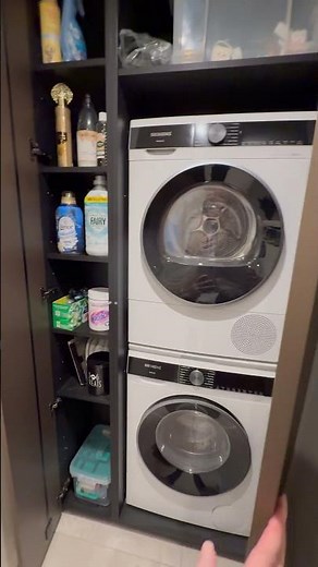 Laundry room with stacked washer dryer