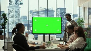 clip-3616164551-diverse-work-team-discusses-corporate-strategies-big