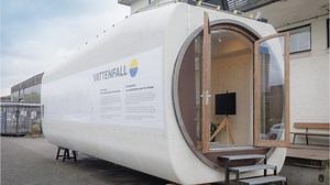 Designers Transform Discarded Wind Turbine Into Solar-Powered Tiny Home
