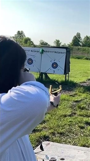 Slow-motion slingshot release — a moment of pure forest focus.