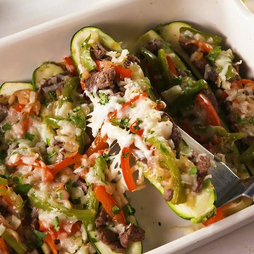 Cheesesteak Zucchini Boats are low carb, high flavor. Full recipe: http://dlsh.it/S1jroXU | Delish