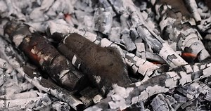 ashes and coals in the fire while cooking food, a dying fire for cooking meat on coals