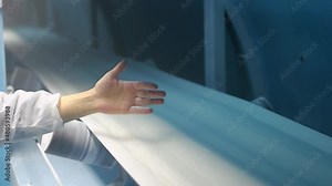 Refined Sugar Moves Along A Conveyor Belt At The Sugar Refinery. Sugar Refinery Quality Control Inspector Checking Process Of Sugar Refining.