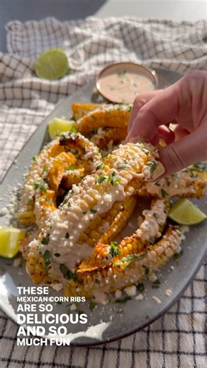 Vesela Asenova| Recipe Creator on Instagram: "Mexican Corn Ribs- my favorite recipe at the moment- can’t get enough of them! 😆🤤 Ingredients: 3 corn on the Cobb 1/4 cup olive oil 1/2 tsp salt 1/2 tsp smoked paprika 1/4 tsp chipotle chili powder 1/4 tsp garlic powder 1/4 tsp black pepper 3 tbs @caciquefoods Cotija, crumbled 2 tbs cilantro Elote sauce: 1/4 cup mayonnaise 1/4 cup sour cream 1/2 lime, juiced + zested 1/2 tsp salt 1 tsp chipotle chilies in Adobo 1/4 tsp garlic powder 1/4 tsp smoked