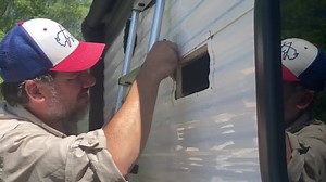 In this #RVlife video, Jason does a quick and easy repair on our Heartland Pioneer QB300 - the RV range hood exterior vent cover. #rvlife #buslife #vanlife #RVMiles #RVRepair #DIY | RV Miles