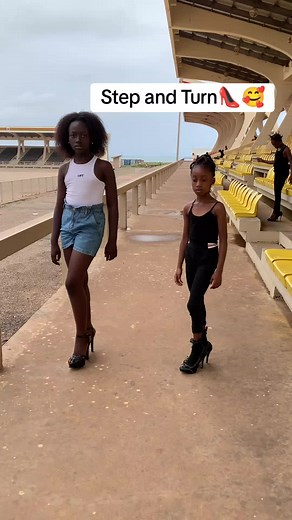 Kid Model Walking on the Catwalk Runway