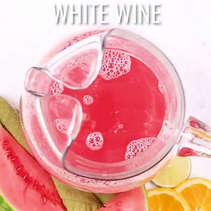 WATERMELON SANGRIA is so simple to make and the ulitmate summer cocktail! RECIPE-->https://realhousemoms.com/watermelon-sangria-brunchweek/ | Real Housemoms
