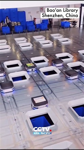 CCTV Asia Pacific on Instagram: "📖The Bao’an Library in #Shenzhen, #Guangdong Province, #China, has adopted a smart book-sorting system with the technology widely adopted in logistics. Operated by robotic librarians, the system boosts sorting efficiency to more than ten times that of traditional manual methods. Take a look! 📖未来科技图书馆！位于 #中国 #广东 #深圳 的宝安图书馆，通过常用于物流领域的智能分拣 #机器人，协助完成借书、还书流程，效率达到传统人工分拣的10倍以上。一起来看！ Video: Douyin"