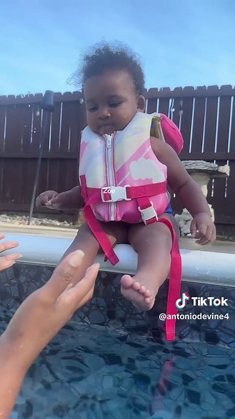 Zoe's Joyful Jump into the Water