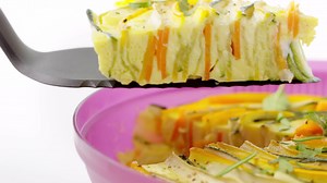 From breakfast to dinner, the Micro Healthy Delight is all about helping you create quick, nutritious and fresh meals promptly! Try this Vegetable Egg Flower recipe: Ingredients: 2 small zucchini 1 small carrot 3 tbsp water (± 45ml) 3 eggs 1 sprig of fresh thyme Method: 1. Rinse the vegetables. Cut the tips of both ends using the Utility Essential Knife. Make some vegetable lasagna and arrange the slices in the Micro Healthy Delight base. Pour 1 tbsp/15 ml water, cover and cook in the microwave 