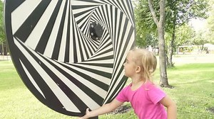 Little Girl Plays Hypnotic Spiral Tunnel Stock Footage Video (100% Royalty-free) 18905084 | Shutterstock