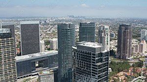 High birds eye view of Century City buildings and skyscrapers with LA skyline