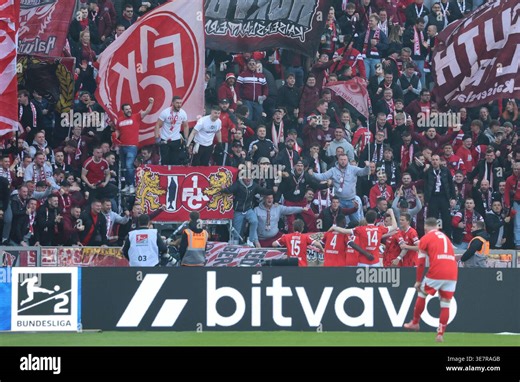 BERLIN, DEUTSCHLAND - APRIL 11: celebration, cheering, goal,. The team of Kaiserslautern celebrates in front of their fans after scoring the 0:1 goal during the match in the 2. German Bundesliga: Hertha BSC - 1. FC Kaiserslautern at Olympiastadion on matchday 29 on April 11, 2026 in Berlin, Deutschland. #DFB regulations prohibit any use of photographs as image sequences and/or quasi video Stock Photo - Alamy