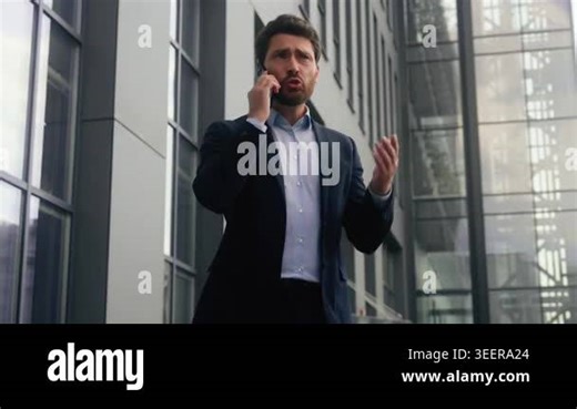 Angry Caucasian business man yelling smartphone conflict call outside city office stressed male businessman manager quarrel problem European guy screaming arguing discuss bad news chat outdoors urban Stock Video Footage - Alamy