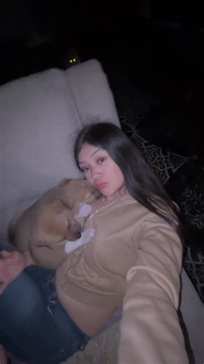 Cuddling with a Puppy: A Cozy Moment of Comfort