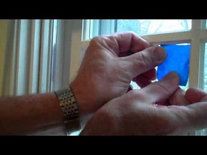 Tips for taping around a window before painting