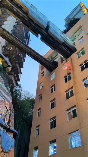 1.4M views · 12K reactions | Chongqing’s Line 2, China’s first monorail and a popular tourist attraction famous for the unique sight of trains passing through a building. | 中国驻苏丹大使馆السفارة الصينية في السودان | Facebook