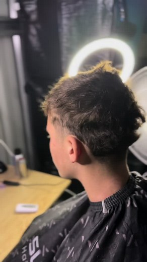 Best Haircuts for Curly Hair: 8 Guard Buzz Style