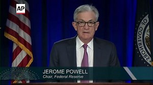 Fed notes improving economy, eyes easing support