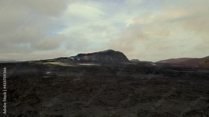 Beautiful aerial cinematic footage of the bowling lava exploding from the Active Volcano in Iceland