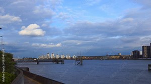 River Thames panoramic view in Woolwich district of London, England. Tall ships sailing in a distance